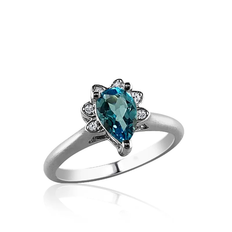 Flat knot engagement rings-Sterling silver ring with cz's and center blue topaz