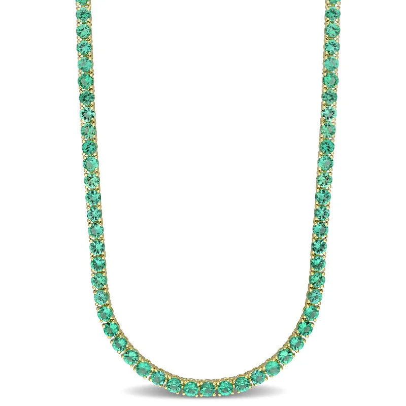 Worn medallion necklaces-Miadora 7 1/2ct TGW Emerald Tennis Necklace in 14k Yellow Gold