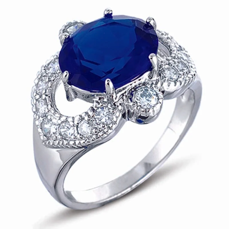 Sleek gem engagement rings-STERLING SILVER RING WITH BLUE AND CLEAR CZ STONES