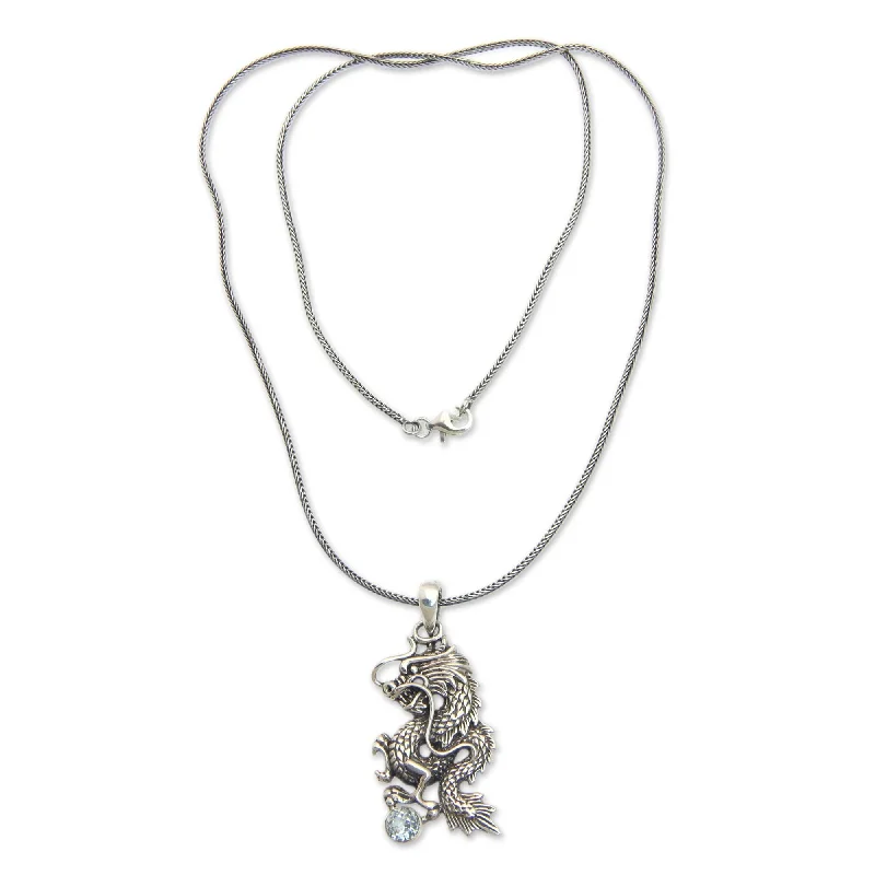 Stretch cord necklaces-Handmade Men's Sterling Silver 'Dragon's Ball' Blue Topaz Necklace (Indonesia)